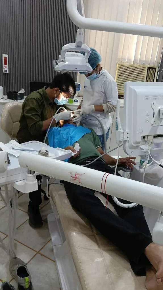 Dentoveda clinical team treating a patient